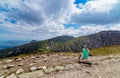 Young woman resting on mountain track Royalty Free Stock Photo