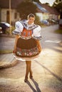 Young woman in a richly decorated ceremonial folk dress