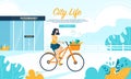 Young Woman Ride Bike with Healthy Food in Basket Royalty Free Stock Photo