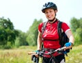 Young Woman riding bicycle