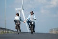 Young woman riding a bicycle with her boyfriend Royalty Free Stock Photo