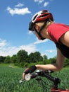 Young woman riding a bike Royalty Free Stock Photo