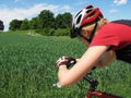 Young woman riding a bike Royalty Free Stock Photo