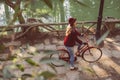 Young woman riding bike on fall day from top angle Royalty Free Stock Photo