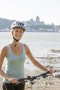 Young Woman Riding Bike outside