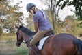 Young woman riding horse Royalty Free Stock Photo