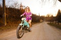 Young woman riding a lifestyle vintage bike