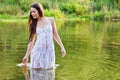 Young woman in a river Royalty Free Stock Photo