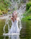 Young woman in a river Royalty Free Stock Photo