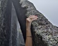Young woman rock climber hands climbing at seaside mountain cliff rock