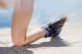 Young woman on roller skates falling down on ground, asphalt Royalty Free Stock Photo