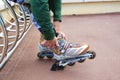 Young woman on roller skates in the park Royalty Free Stock Photo