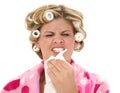 Young Woman in Rollers and Robe Sneezing Royalty Free Stock Photo