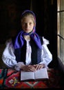 Young woman with Romanian traditional costume in Bucovina, Romania