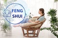 Young woman in room decorated with plants. Feng Shui philosophy Royalty Free Stock Photo