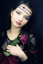 Young woman with a rose. medieval style Royalty Free Stock Photo