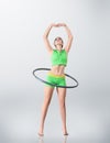 Young Woman Rotating Hula Hoop