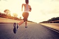 Young woman runner running