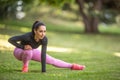 Young woman runner warming up before running Royalty Free Stock Photo