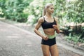 Young Woman Running. Beautiful fit Girl. Fitness model outdoors. Weight Loss. Royalty Free Stock Photo