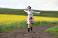 Young woman running on a countryside road Royalty Free Stock Photo