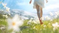 Young woman running on a meadow with flowers in the spring. Royalty Free Stock Photo