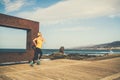 Young woman running in mountains on sunny summer day Royalty Free Stock Photo