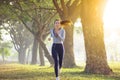 Young woman running in the park at  morning Royalty Free Stock Photo