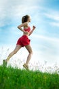 Young woman running summer park rural road Royalty Free Stock Photo