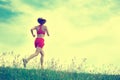 Young woman running summer park rural road Royalty Free Stock Photo