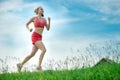 Young woman running summer park rural road Royalty Free Stock Photo