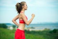 Young woman running summer park rural road Royalty Free Stock Photo