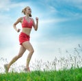 Young woman running summer park rural road. Outdoor exercises. J Royalty Free Stock Photo
