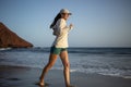 Young woman running on the La Tejita beach Royalty Free Stock Photo