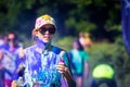 Young woman runs the Color Vibe 5K race Royalty Free Stock Photo