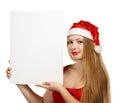 Young woman in santa claus hat with christmas card Royalty Free Stock Photo