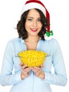 Young Woman in Santa Hat Holding a Bowl of Sweetcorn