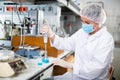 Shot of an young woman using equipment to work in a laboratory Royalty Free Stock Photo