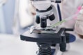 Young woman scientist using microscope working at laboratory Royalty Free Stock Photo