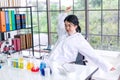 Young woman scientists are lazy in the lab