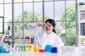 Young woman scientists are lazy in the lab