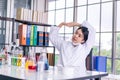 Young woman scientists are lazy in the lab Royalty Free Stock Photo