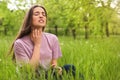 Young woman scratching neck outdoors. Seasonal allergy Royalty Free Stock Photo