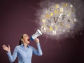 Young woman screaming into a megaphone Royalty Free Stock Photo