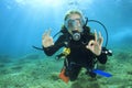 Young woman scuba diving