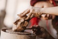 Young woman sculptor artist creating a bust sculpture Royalty Free Stock Photo