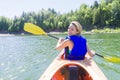 Young woman sea kayaking Royalty Free Stock Photo