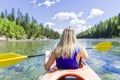 Young woman sea kayaking Royalty Free Stock Photo