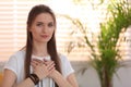 Young woman during self-healing session in room Royalty Free Stock Photo