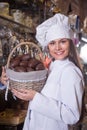 Young woman selling fine chocolates and confectionery Royalty Free Stock Photo